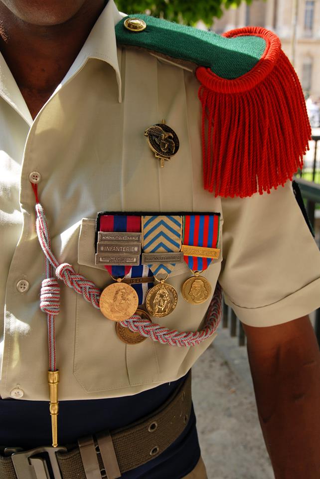 Um legionário e suas medalhas - Fonte - https://pt-br.facebook.com/photo.php?fbid=645263275487431&set=a.452398308107263.118940.452396964774064&type=1&theater